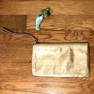 Kate Spade gold leather wristlet